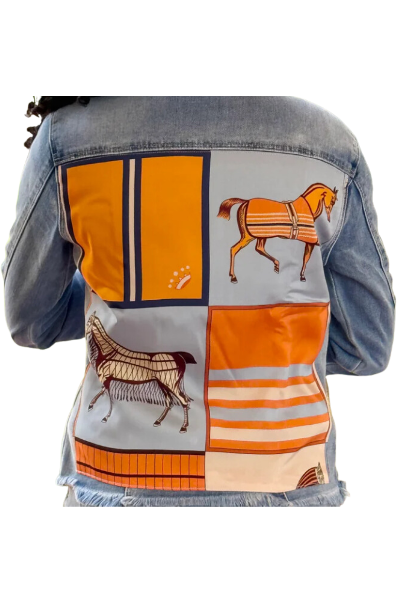 The back view of a denim jacket with a pink and beige geometric pattern design on the upper back area.