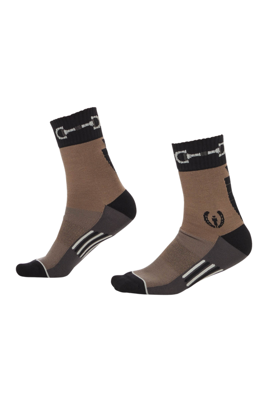 A pair of paddock socks with snaffle and carrot design elements, suitable for equestrian activities.
