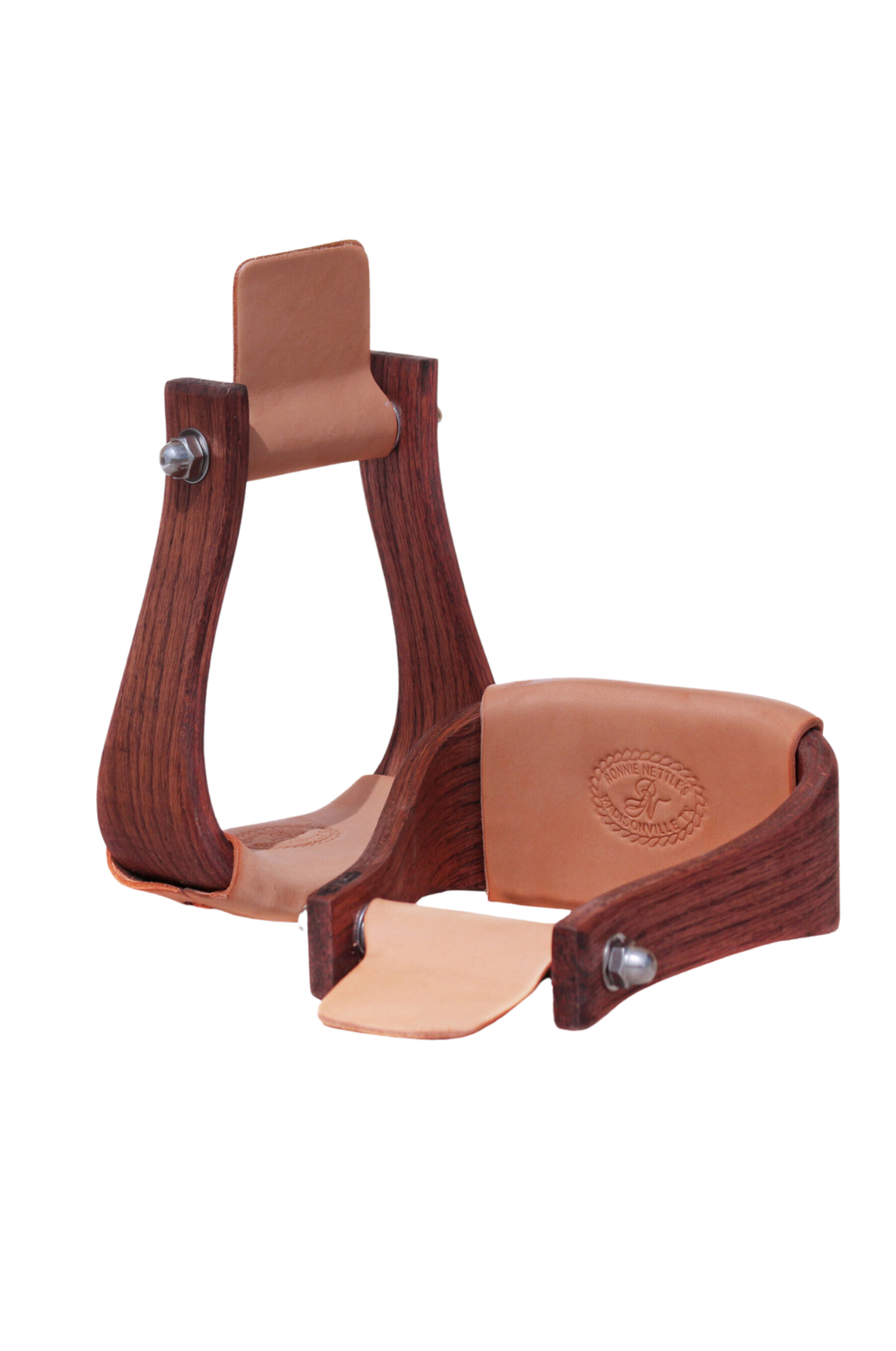 A pair of brown Nettles Chisholm stirrups, designed for use with a saddle, featuring a rustic finish and metal hardware.