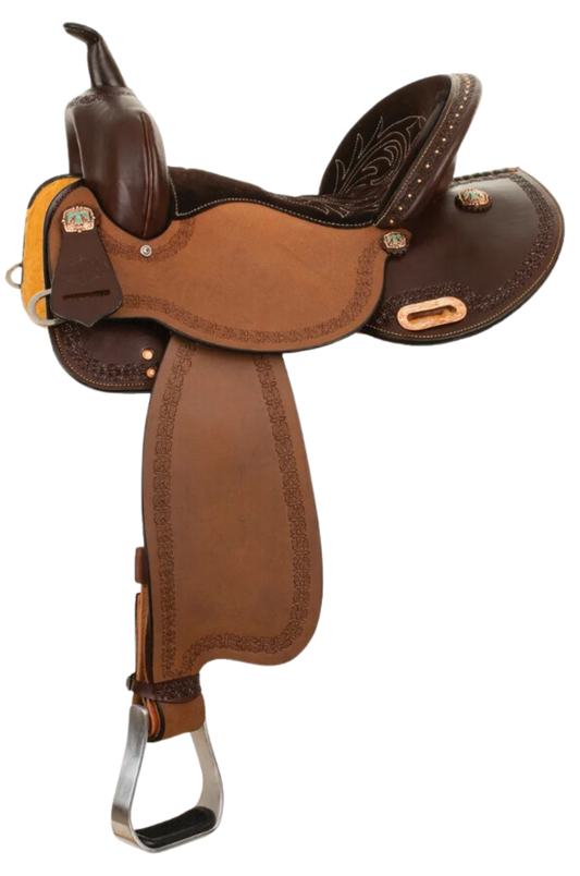 A brown Circle Y Alice Barrel saddle with copper spots and conchos, turquoise hardware, and a rounded skirt.