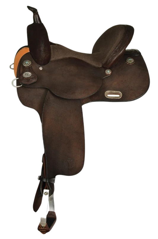 A brown Circle Y Kelly Kaminski barrel saddle with a wooden tree, designed for western riding.