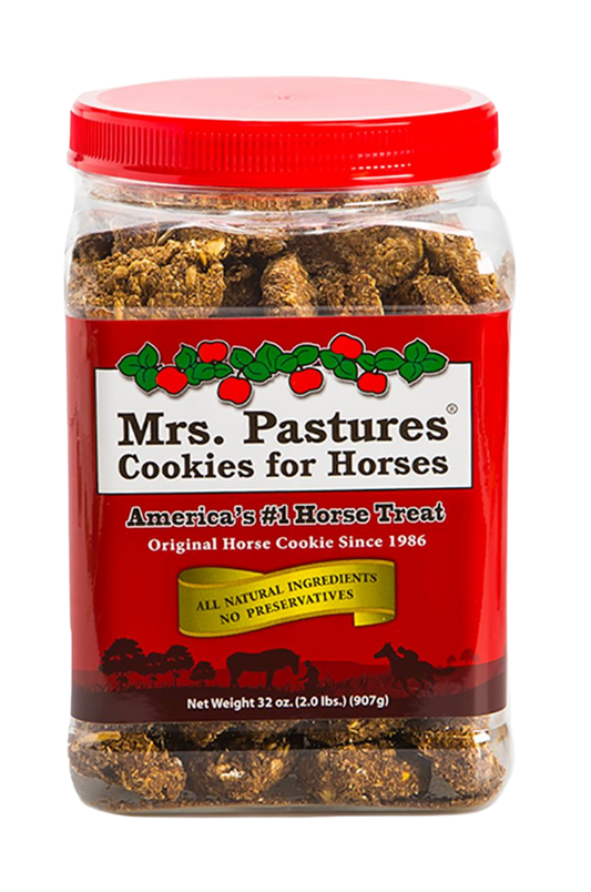 A plastic jar of Mrs. Pastures Cookies for Horses, with a red lid and Christmas-themed decoration on the label.