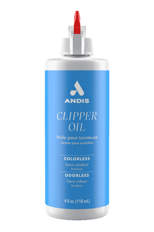 A bottle of Andis Clipper Oil, designed for lubricating and maintaining clipper blades.
