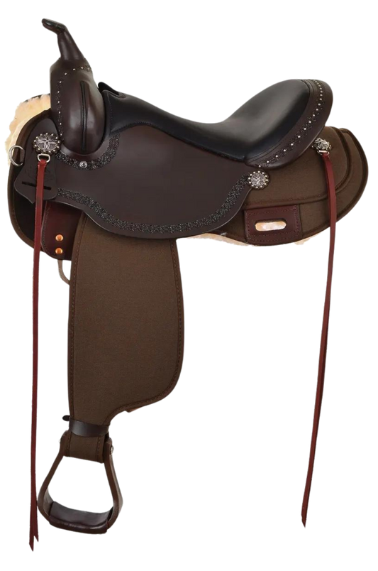 A brown Circle Y Willow Springs Cordura Trail saddle with silver conchos and a butterfly skirt shape, including stirrups and nylon tie straps.