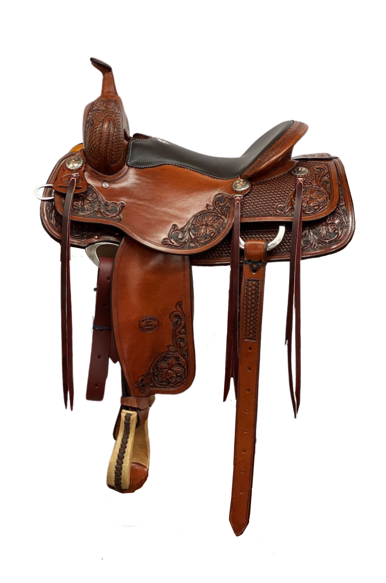 A brown Billy Cook Arbuckle Ranch saddle with rawhide-covered bars, waffle tooling, and brass hardware.