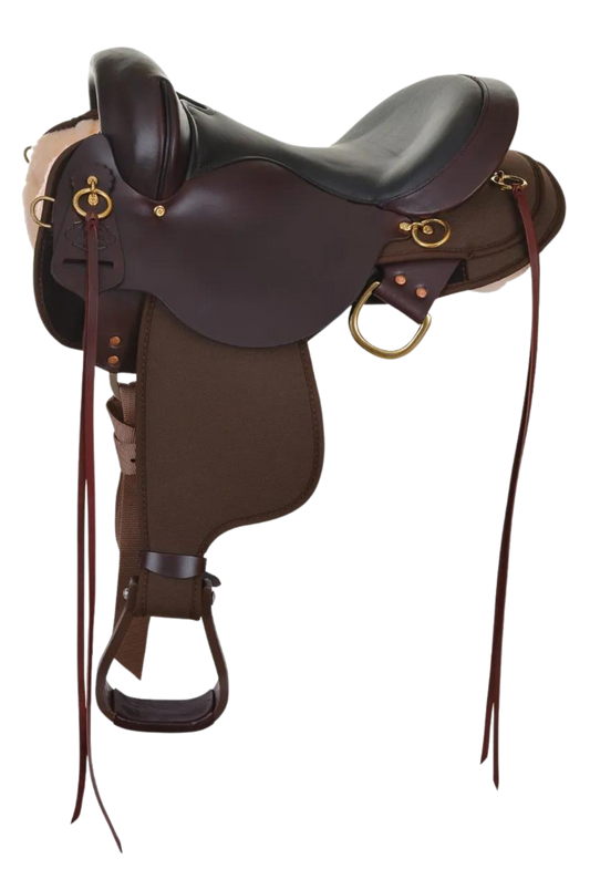 A brown Circle Y Highbank Cordura Trail saddle with brass hardware and no horn, designed for endurance riding.