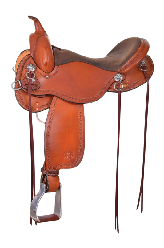 A brown Circle Y Gillette Trail saddle with a wood tree and DURAhide coating, designed for broad shouldered, short backed horses.