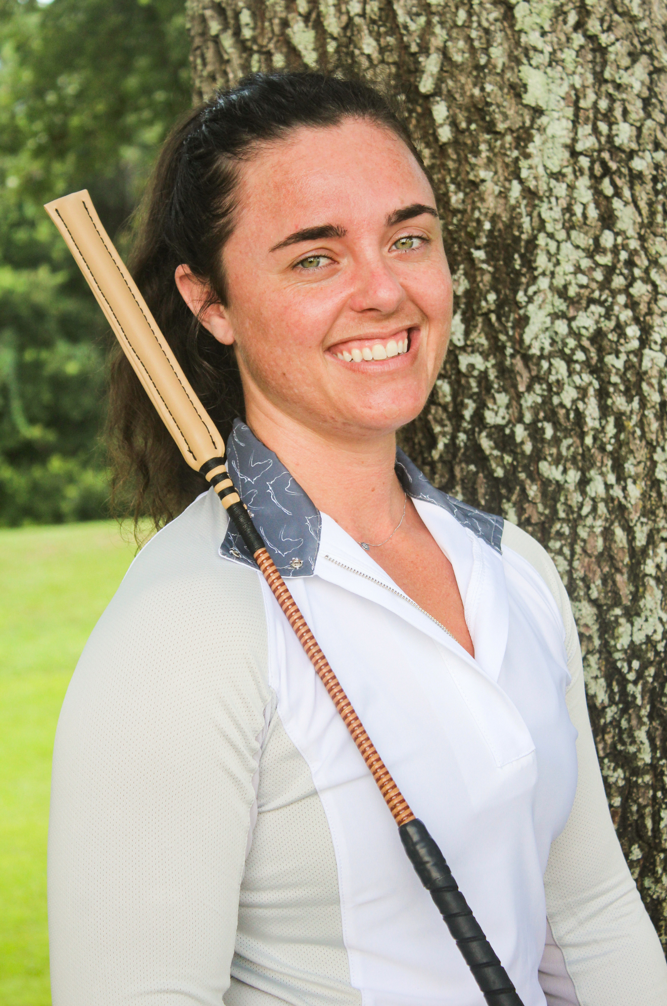 A collection of custom handmade soft crop whips with various handle colors and poppers.