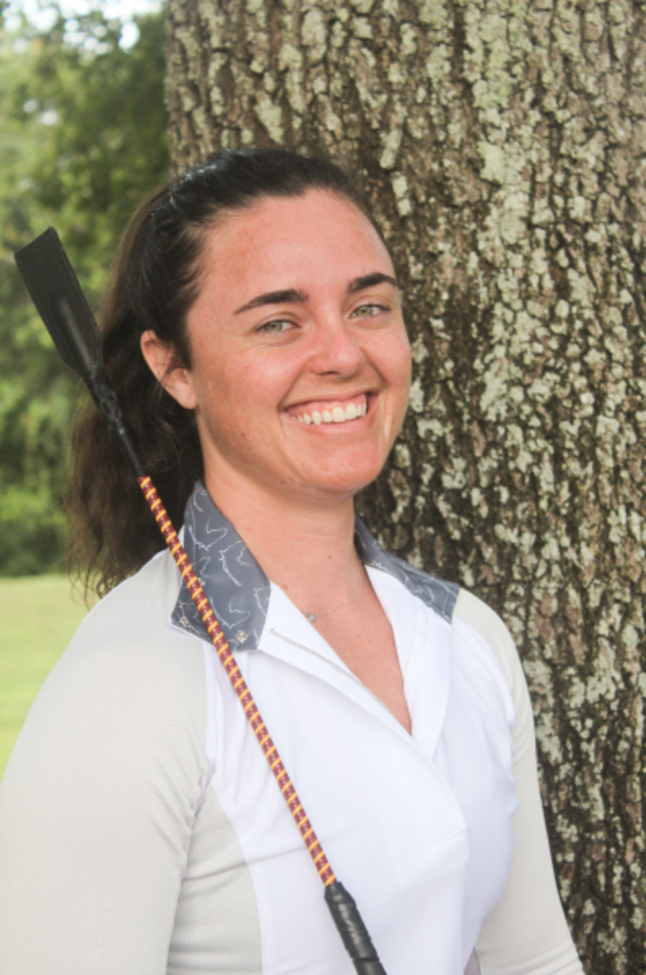 A collection of custom handmade soft crop whips with various handle colors and poppers.