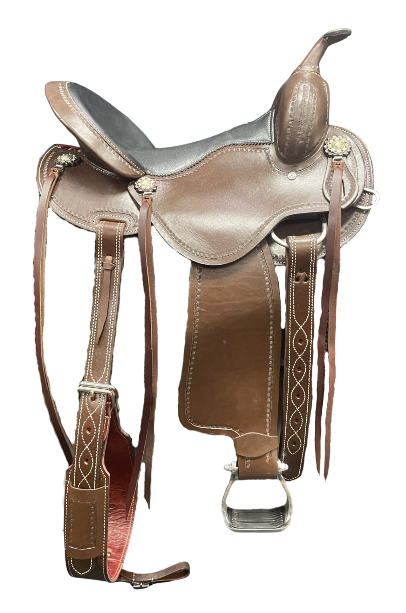 Brown leather saddle with decorative elements on a white background