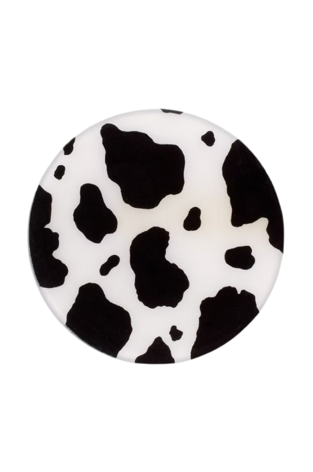 Round object with black and white cow print pattern on a white background