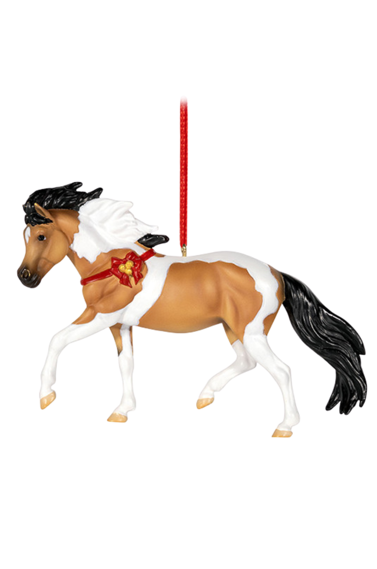 Horse figurine with a decorative saddle on a white background