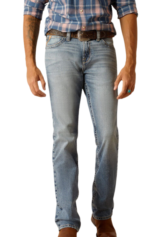 Person wearing light blue jeans and a plaid shirt on a white background