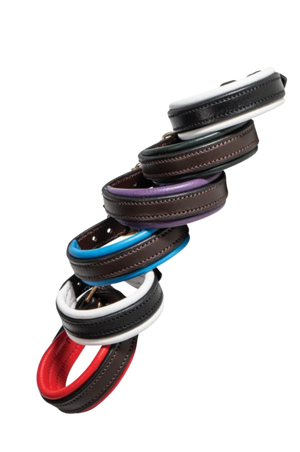 Stack of colorful bracelets on a white background