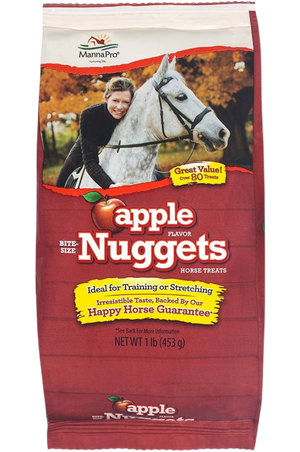 A bag of Manna Pro bite-size nuggets horse treats with a picture of a woman and her horse on the packaging.
