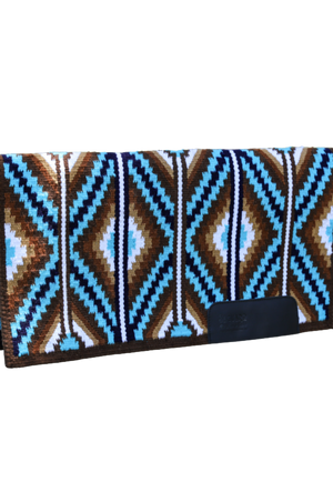 Patterned saddle blanket with blue and brown design on a white background
