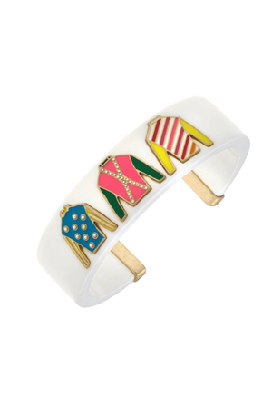 A white resin cuff bracelet with raised colored jockey silk details.