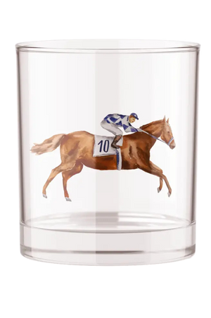A clear rocks glass with a decorative illustration of a horse and jockey in profile, running to the right, with a number '10' on the jockey's helmet.