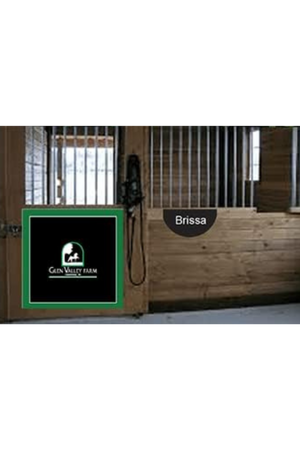 Stable door with 'Brissa' branding and 'Green Valley Farm' logo in a barn setting.