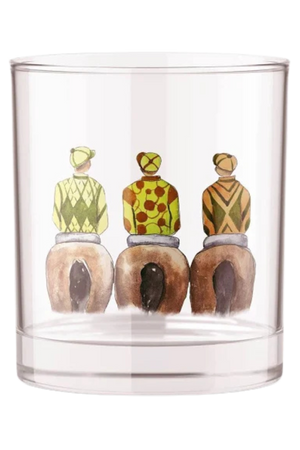 A hand-printed Derby bourbon whiskey rocks glass featuring a design with standing horses back view on the inside.