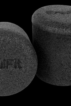 A pair of black silicone ear plugs with the brand name 'EQUIFIT' embossed on the top surface.