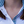 White polo shirt with a logo on a white background