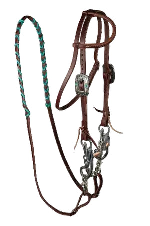 A brown pony bridle set with blue and silver accented reins.