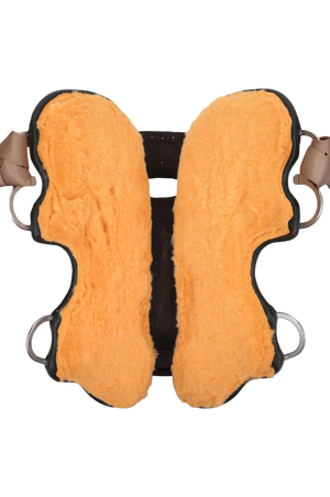 A brown leather saddle with cutout skirt, braided strings, and lightning bolt conchos, designed for barrel racing.