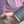 Purple sweater with elbow patches on a white background