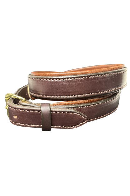 Brown leather belt with gold buckle on a white background