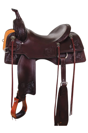 A brown leather western saddle with floral tooling and orange rawhide accents.