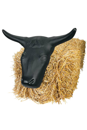 A black steer head roping dummy attached to a bundle of hay.
