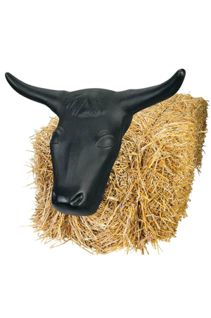 A black steer head roping dummy attached to a bundle of hay.