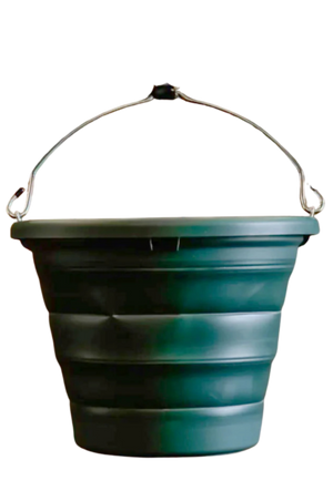 A dark green BOSS BUCKET with a hard plastic rim and bottom and a thick silicone middle, designed to lay flat.