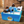 A large plastic tote box with multiple compartments and an easy-grip handle.