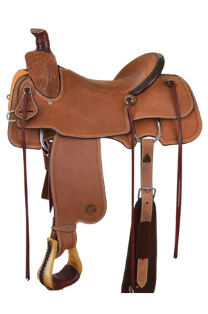 A brown leather saddle with a walnut finish, designed for rough use with a hardseat, fenders, and matching flank cinch. Arizona flowers are visible on the saddle.