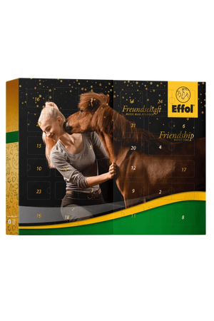 A Effol Advent Calendar box designed for horse care, featuring various horse care products and a festive design with a horse and rider on the front.