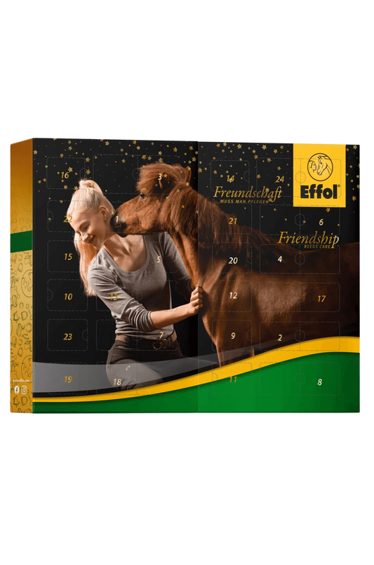A Effol Advent Calendar box designed for horse care, featuring various horse care products and a festive design with a horse and rider on the front.