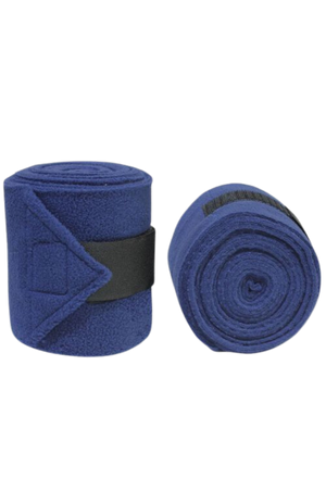 Vac's Deluxe Polo bandages wrapped around a horse's forelimbs, showing the folded ends with hook and loop fasteners.