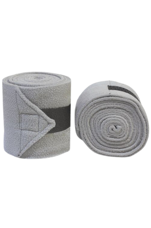 Vac's Deluxe Polo bandages wrapped around a horse's forelimbs, showing the folded ends with hook and loop fasteners.