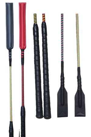 A collection of custom handmade soft crop whips with various handle colors and poppers.