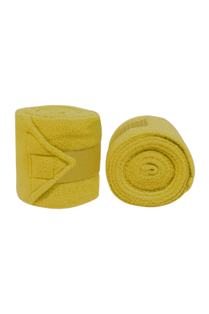 Vac's Deluxe Polo bandages wrapped around a horse's forelimbs, showing the folded ends with hook and loop fasteners.