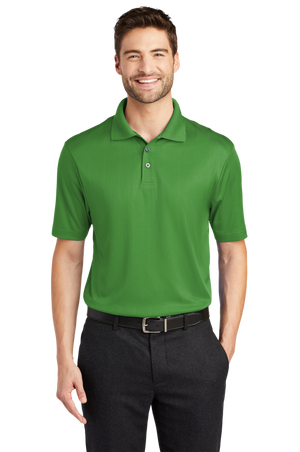 A man wearing a short-sleeved performance polo shirt with a collar, a 3-button placket, and black pants.