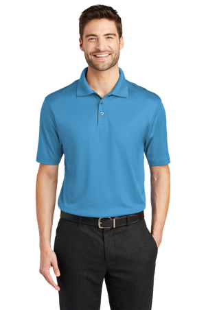 A man wearing a short-sleeved performance polo shirt with a collar, a 3-button placket, and black pants.