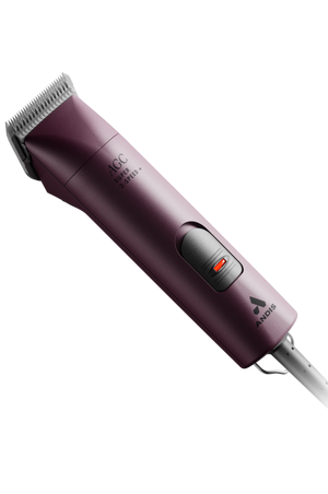 A professional Andis clipper with a purple and black color scheme, featuring a 2-speed setting and a locking switch button. The clipper includes a size 10 UltraEdge blade and has a maintenance-free design with a sealed motor.