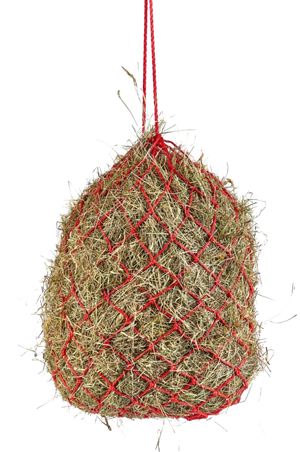 A red haylage net filled with hay.