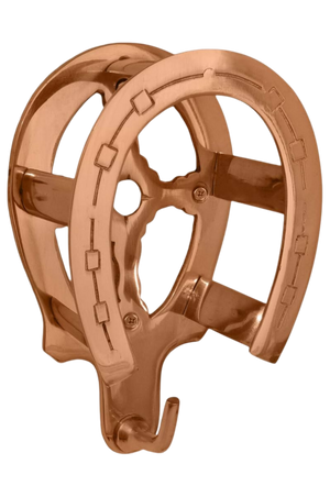 A golden horse shoe with a bridle bracket attached to it, displayed against a white background.