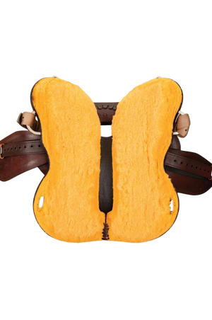 A brown Circle Y Green Valley Trail saddle with brass details and stirrups.