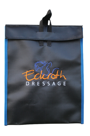 A custom vinyl feed bag with embroidery, predominantly black with blue trim and a logo that reads 'Edelth Dressage' in orange and white.