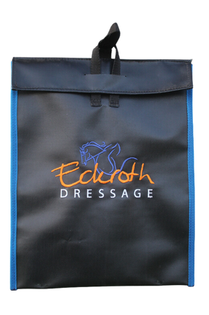 A custom vinyl feed bag with embroidery, predominantly black with blue trim and a logo that reads 'Edelth Dressage' in orange and white.